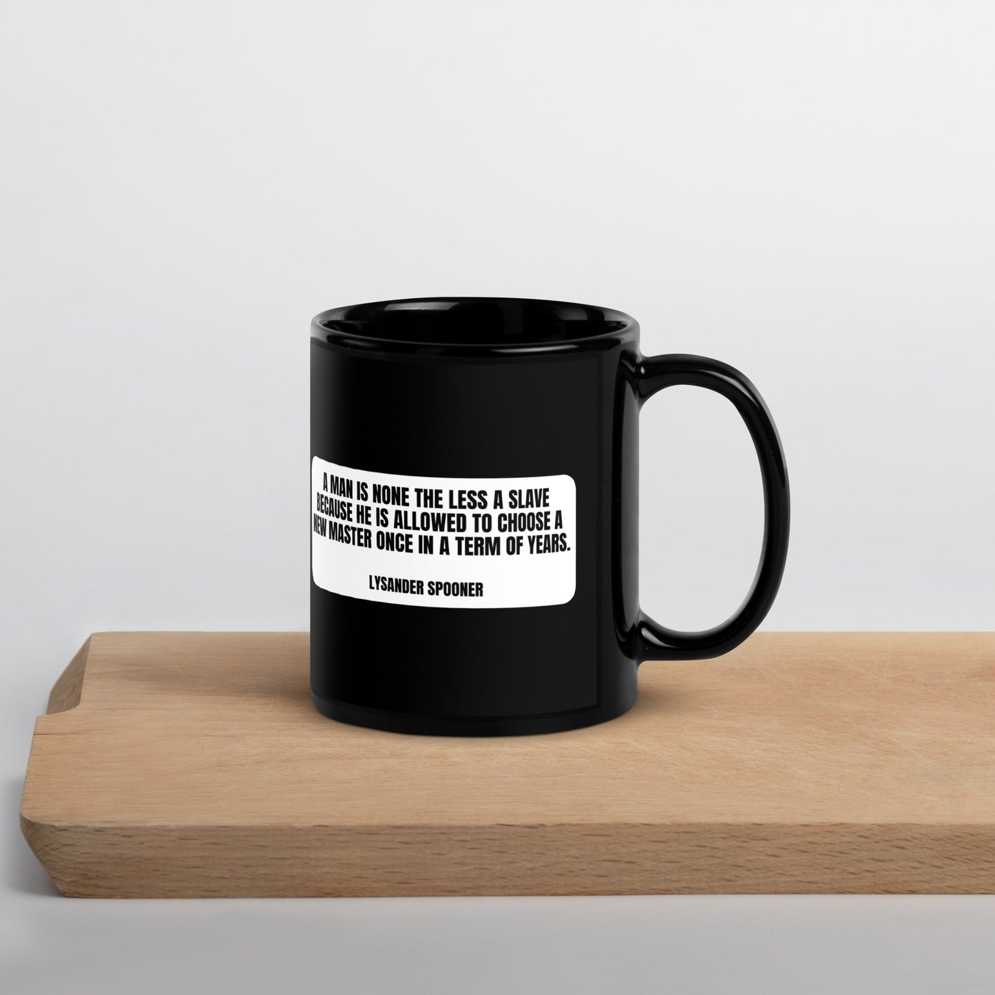 A man is none the less a slave... - Lysander Spooner Black Glossy Mug