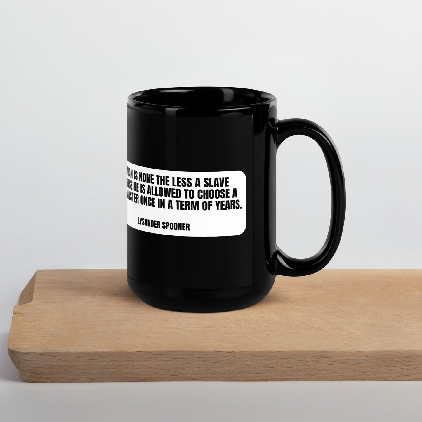 A man is none the less a slave... - Lysander Spooner Black Glossy Mug