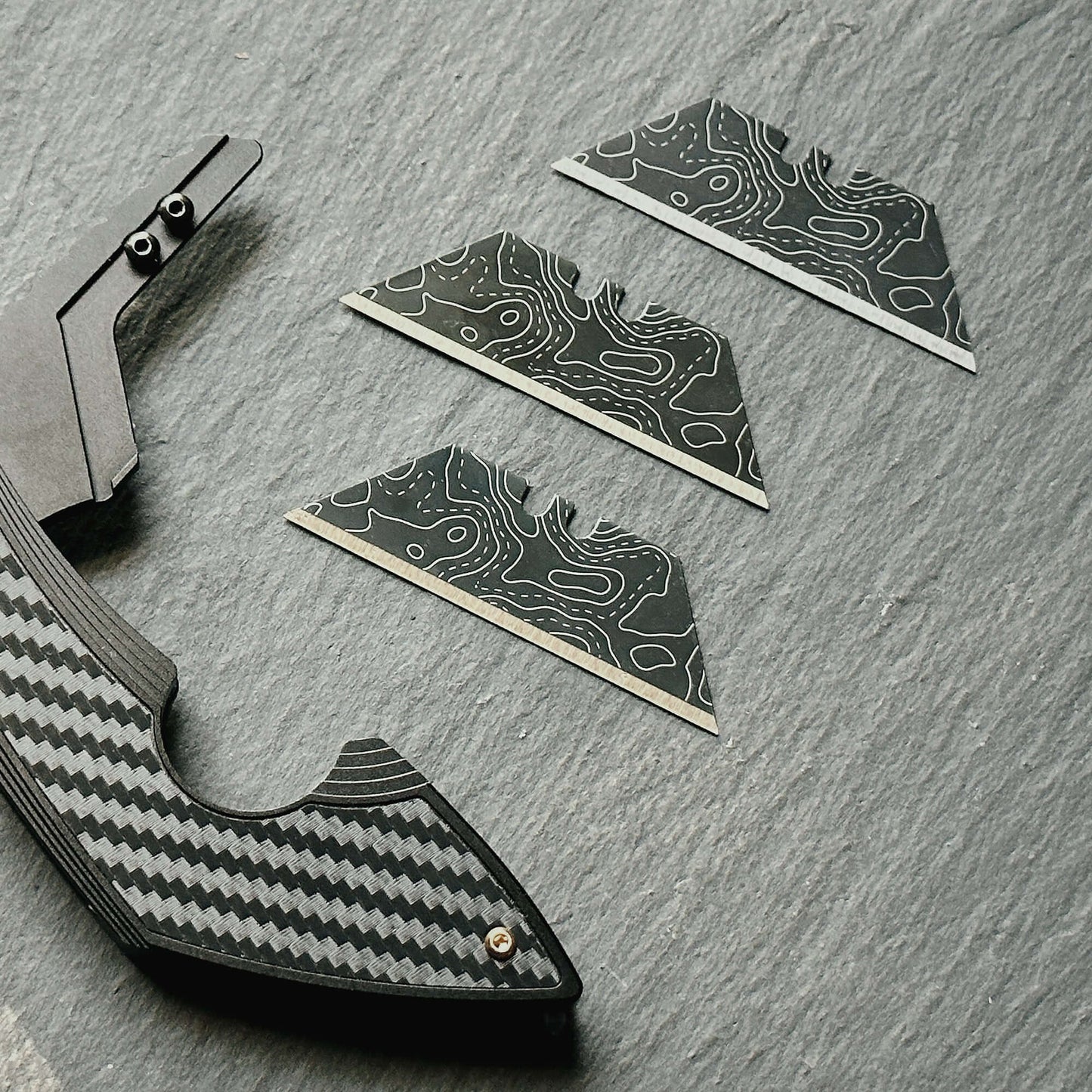 Stinger Laser Engraved Utility Razor Blades, Utility Knife Blades Replacement - Black Topographic Style (Trapezoid 3 pcs - Black)